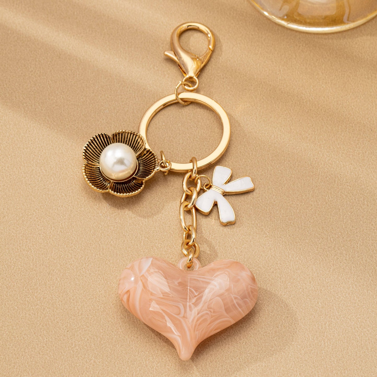 BAG CHARM KEY CHAIN-SWIRL HEART PERAL FLORAL BOW
