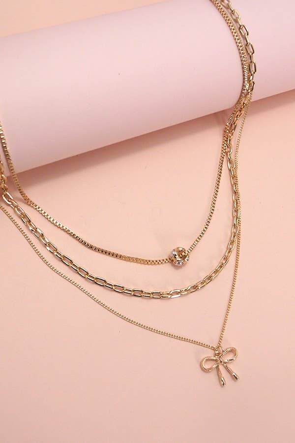 MULTI LAYER PEARL BOW CHARM NECKLACE